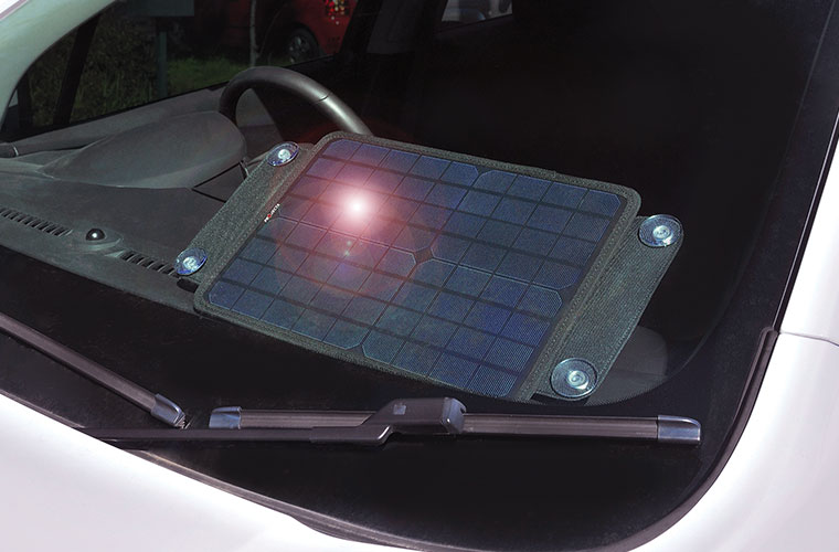 Maintenance Solar Panel on Car Dashboard