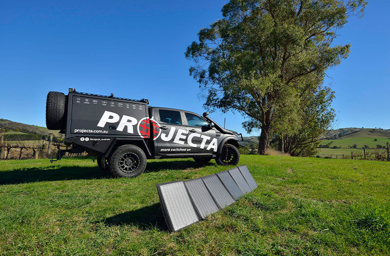 Soft Folding Solar Panel in field charging 4x4